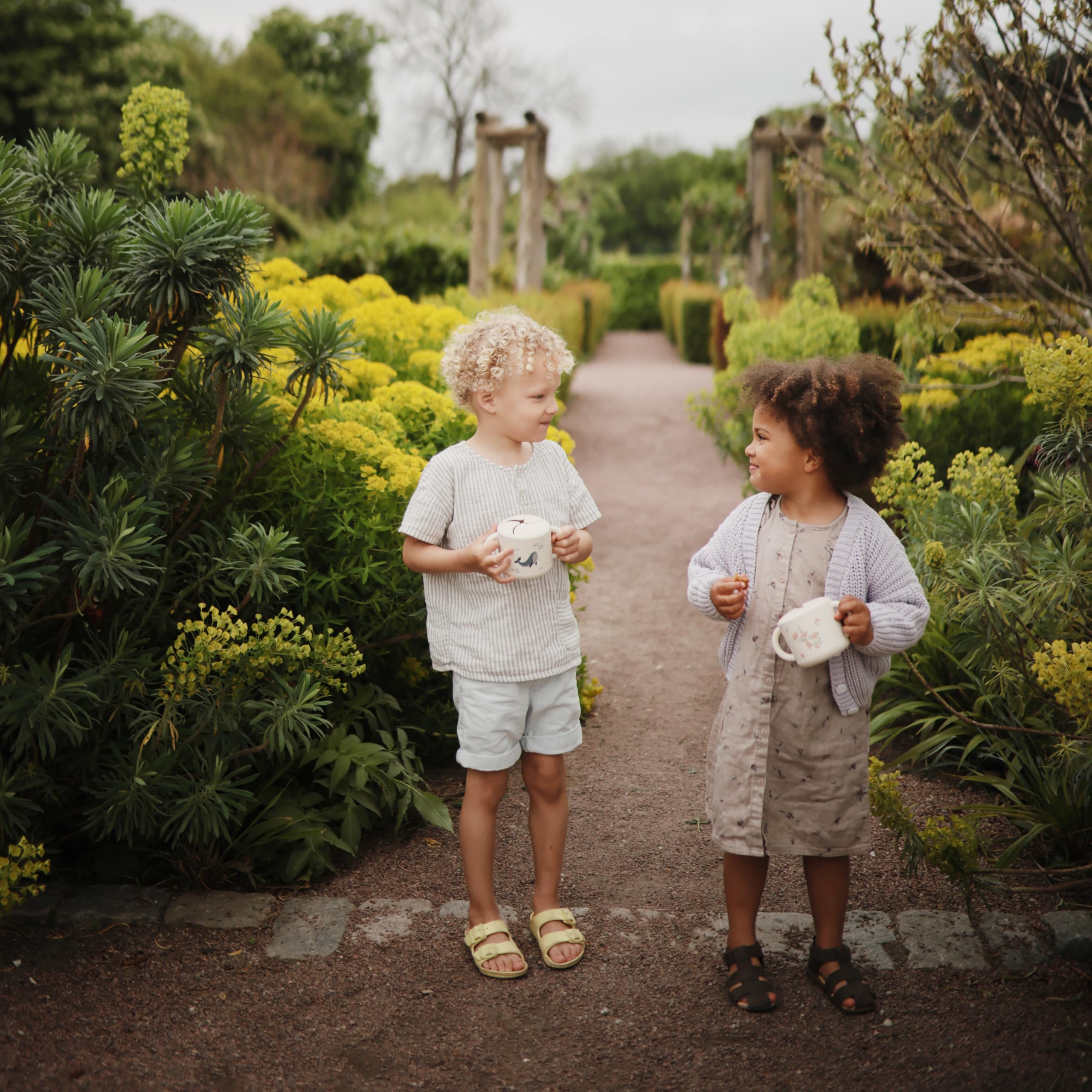 Mushie silicone snack cup whales material close-up highlights BPA and phthalate-free silicone.