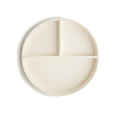 Mushie silicone suction plate ivory top view shows non-slip base reducing spills.