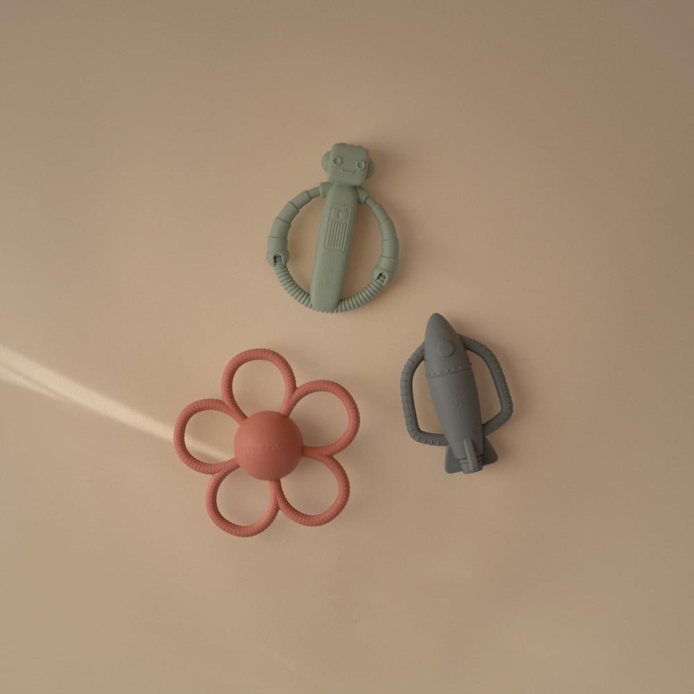Mushie silicone teether texture closeup featuring soft surface for gentle gum massage