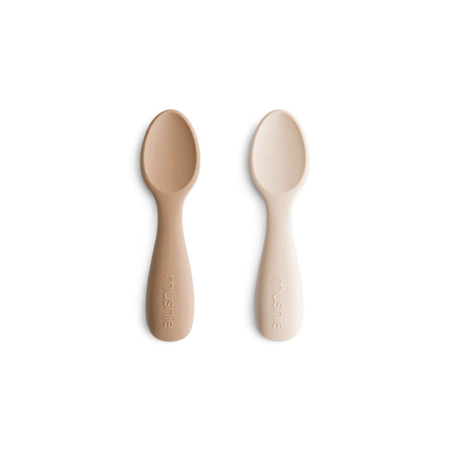 Mushie silicone toddler starter spoons natural closeup showing gentle silicone for sensitive gums