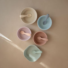 Mushie spoons soft silicone closeup emphasizing gentle touch for tender gums