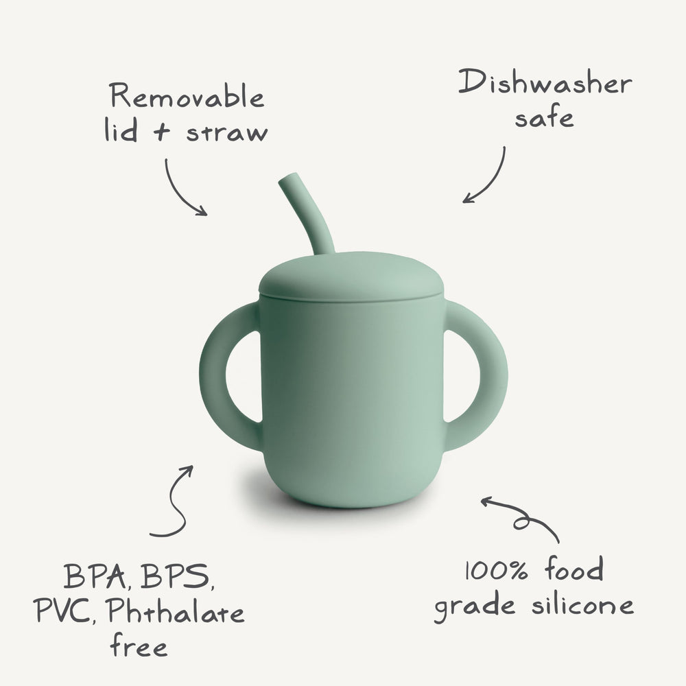 Mushie silicone training cup straw close-up highlights gentle straw for tender gums during transitions.