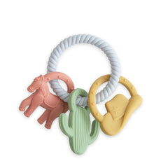 Mushie silicone western teething ring closeup highlights soft, safe chew surface for teething