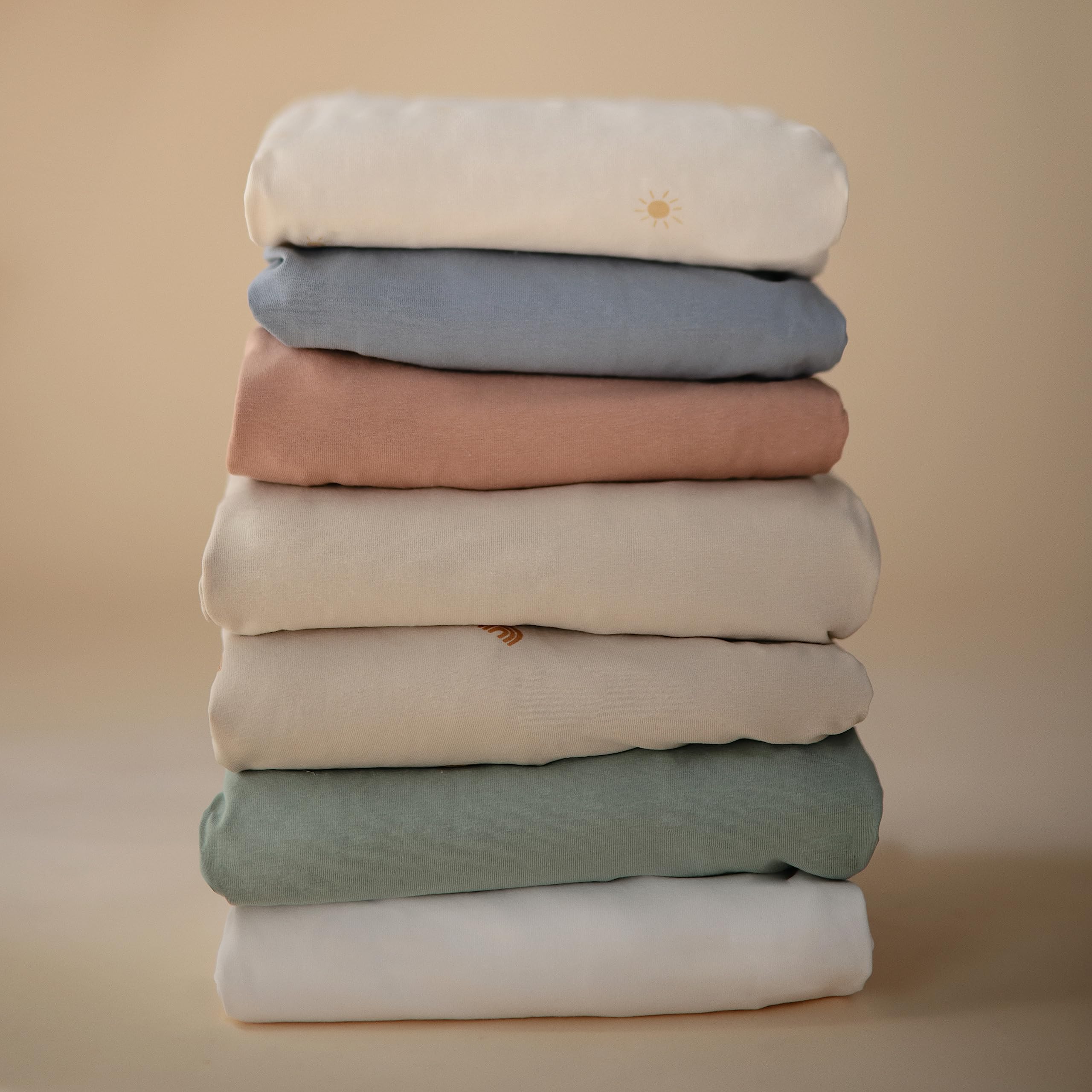 Mushie care instructions for Roman Green bassinet sheet