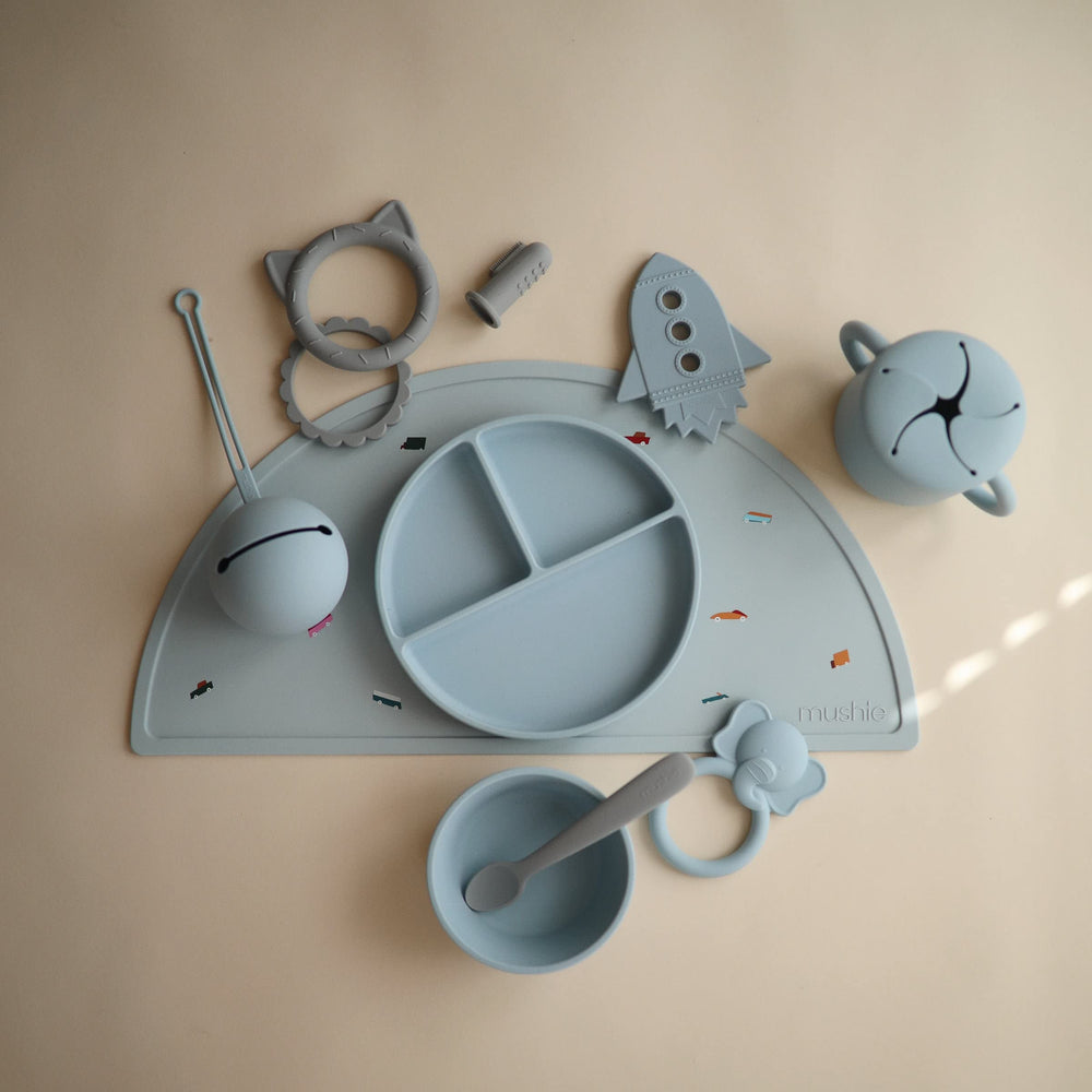 Mushie teether BPA-free material promotes safe chewing choices.