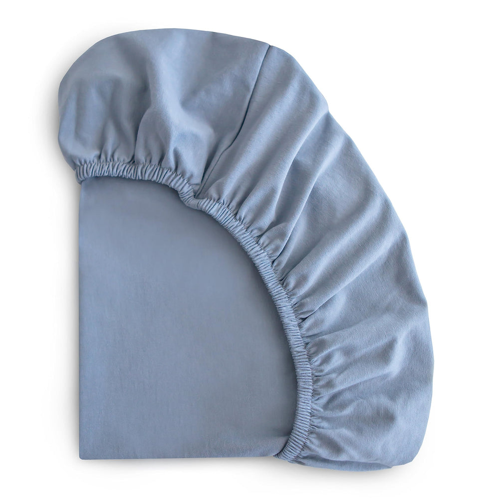 Mushie Tradewinds crib sheet knit texture promotes breathable comfort