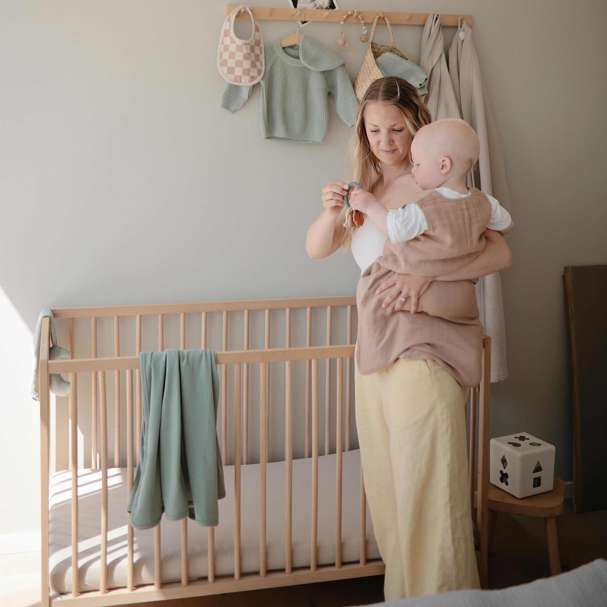 Mushie Tradewinds crib sheet organic cotton elastane blend offers gentle stretch