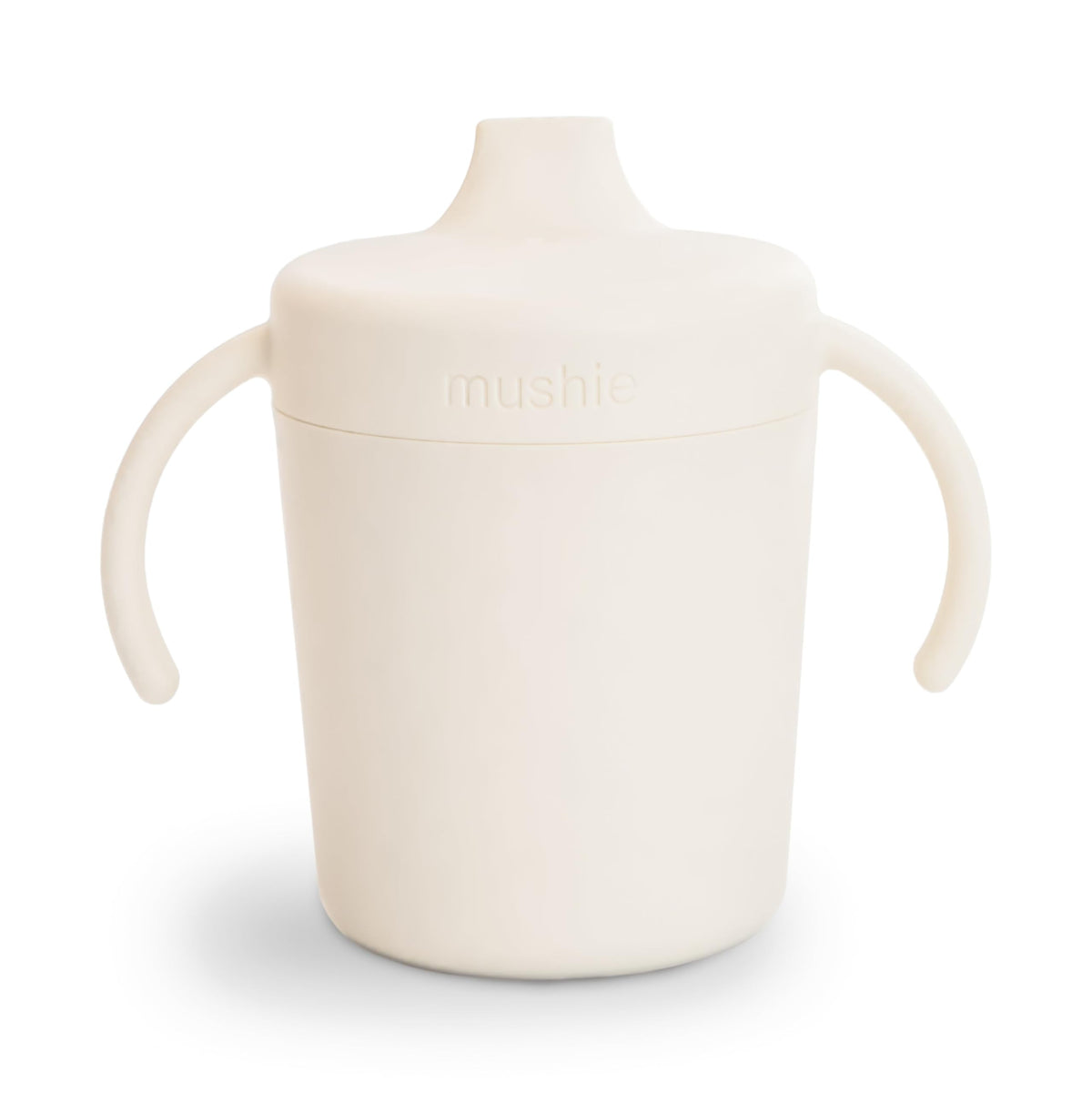Mushie Trainer Sippy Cup Ivory close-up lid shows leak-resistant design.