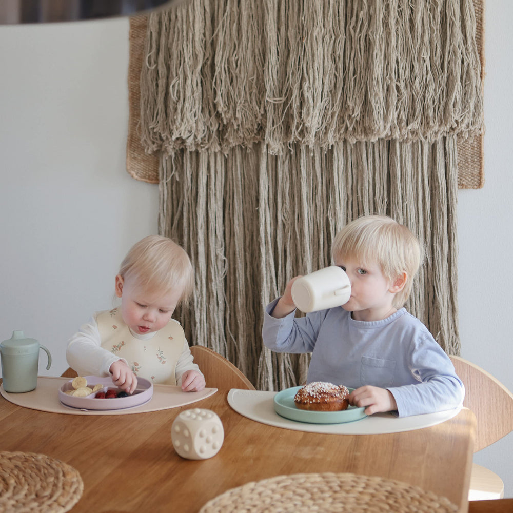 Mushie Trainer Sippy Cup Ivory dishwasher-safe for simple cleaning.