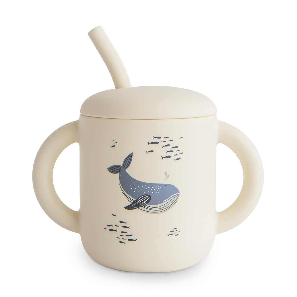 Mushie training cup whales lid close-up shows spill-proof feature for mess-free meals.