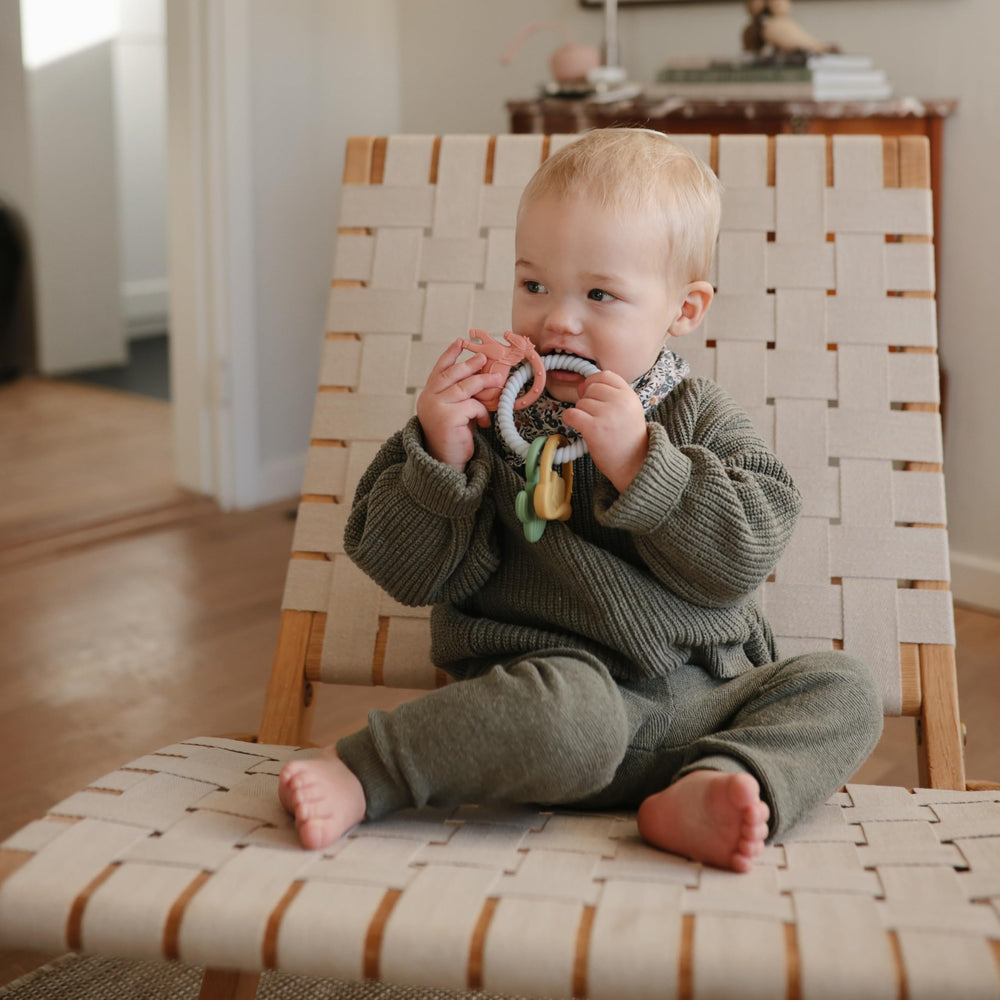 Mushie western teething ring angle shot emphasizes compact size for easy portability