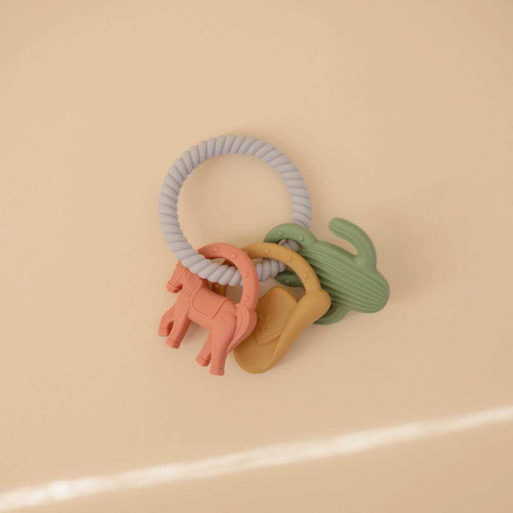 Mushie western teething ring flat lay shows quick cleaning readiness