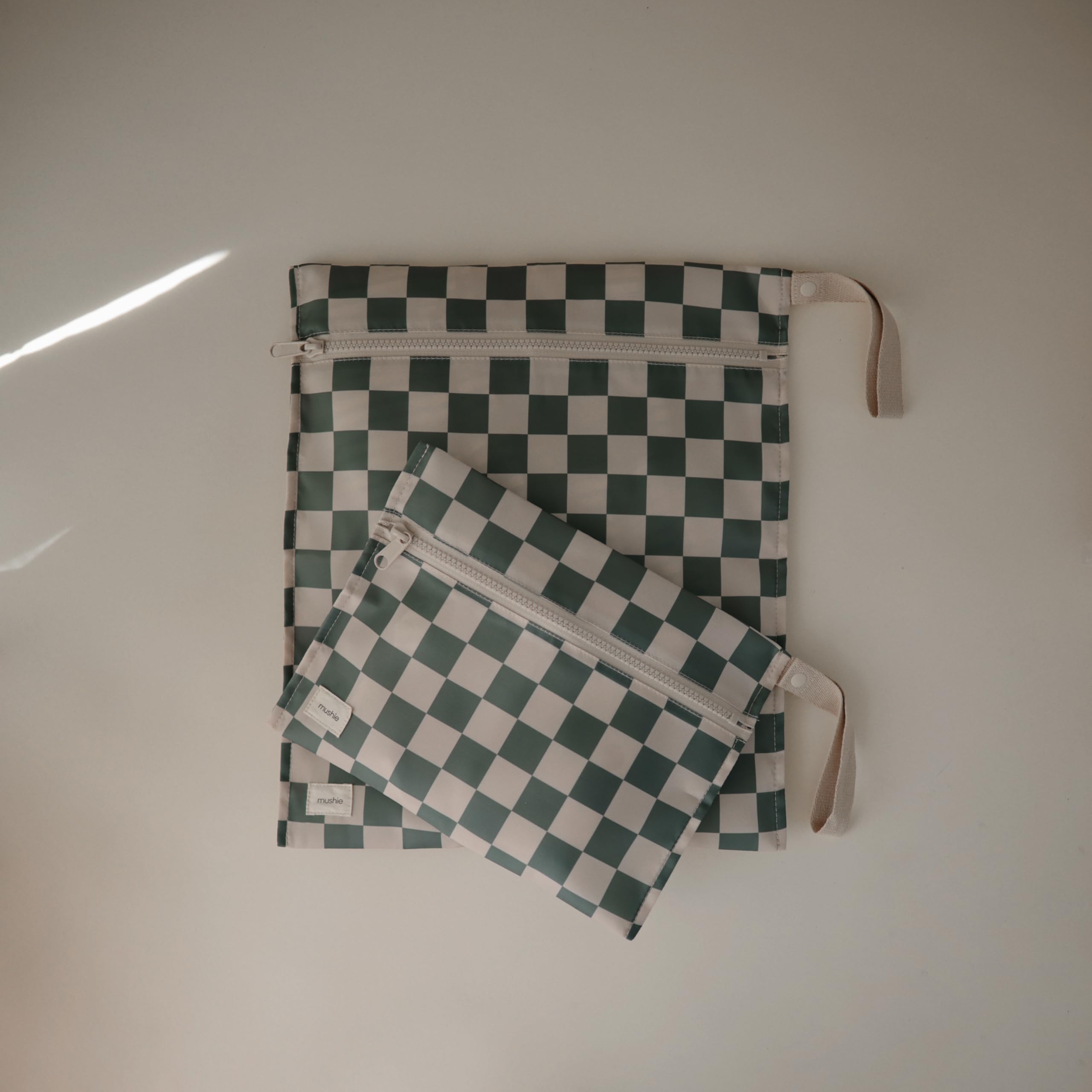 Mushie wet bag olive check small, portable and easy to stash dirty clothes.