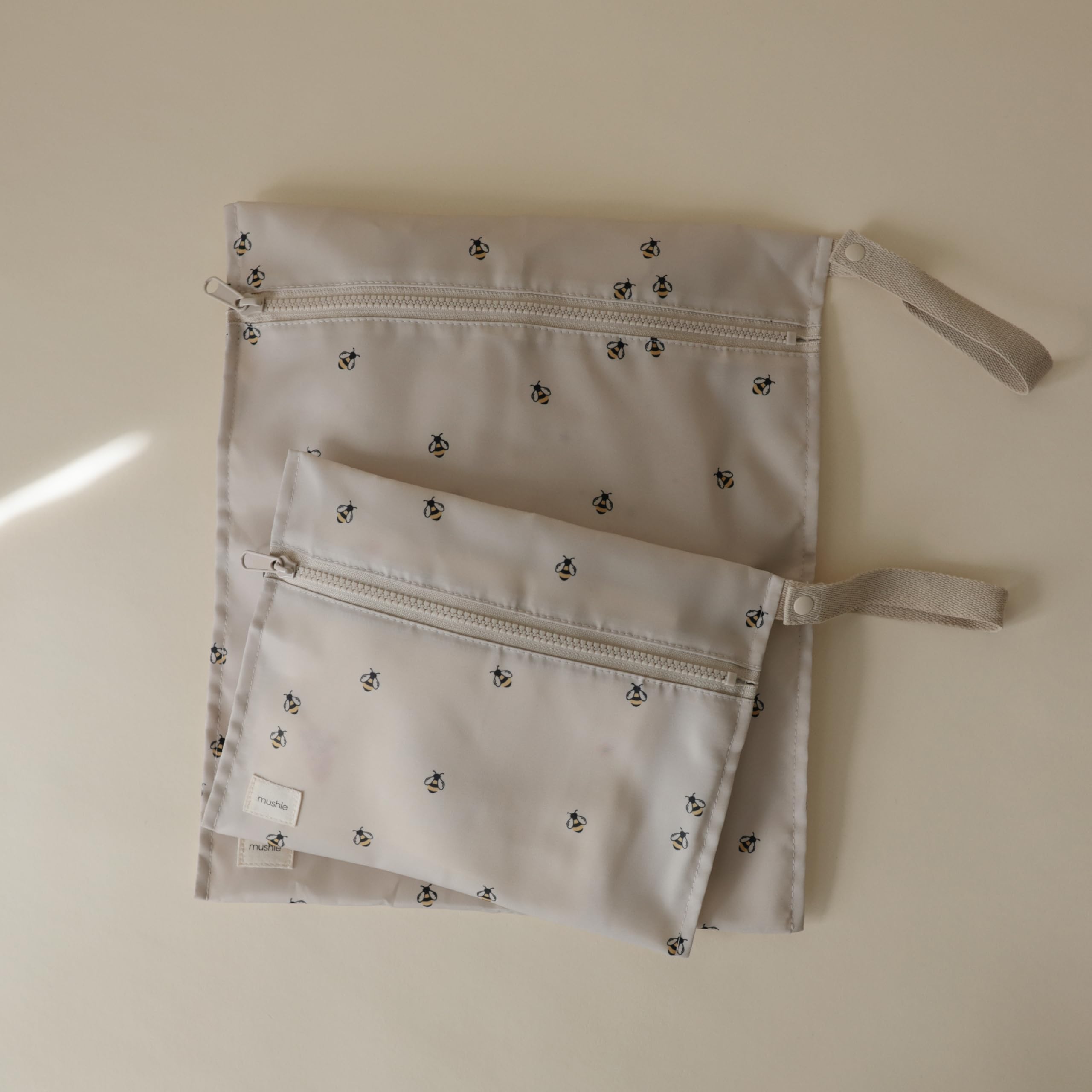 Mushie wet bags small 10.5x8 inches for quick diaper bag packing.