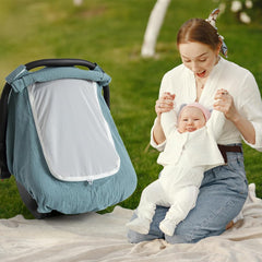 Muslin cotton baby car seat cover green fabric texture emphasizes lightweight breathability