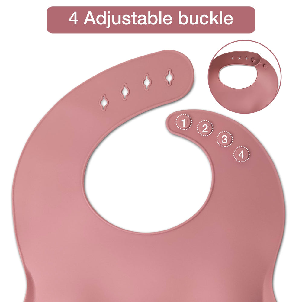 Mutualproducts silicone spoons pink ergonomic grip aids tiny hands during meals.
