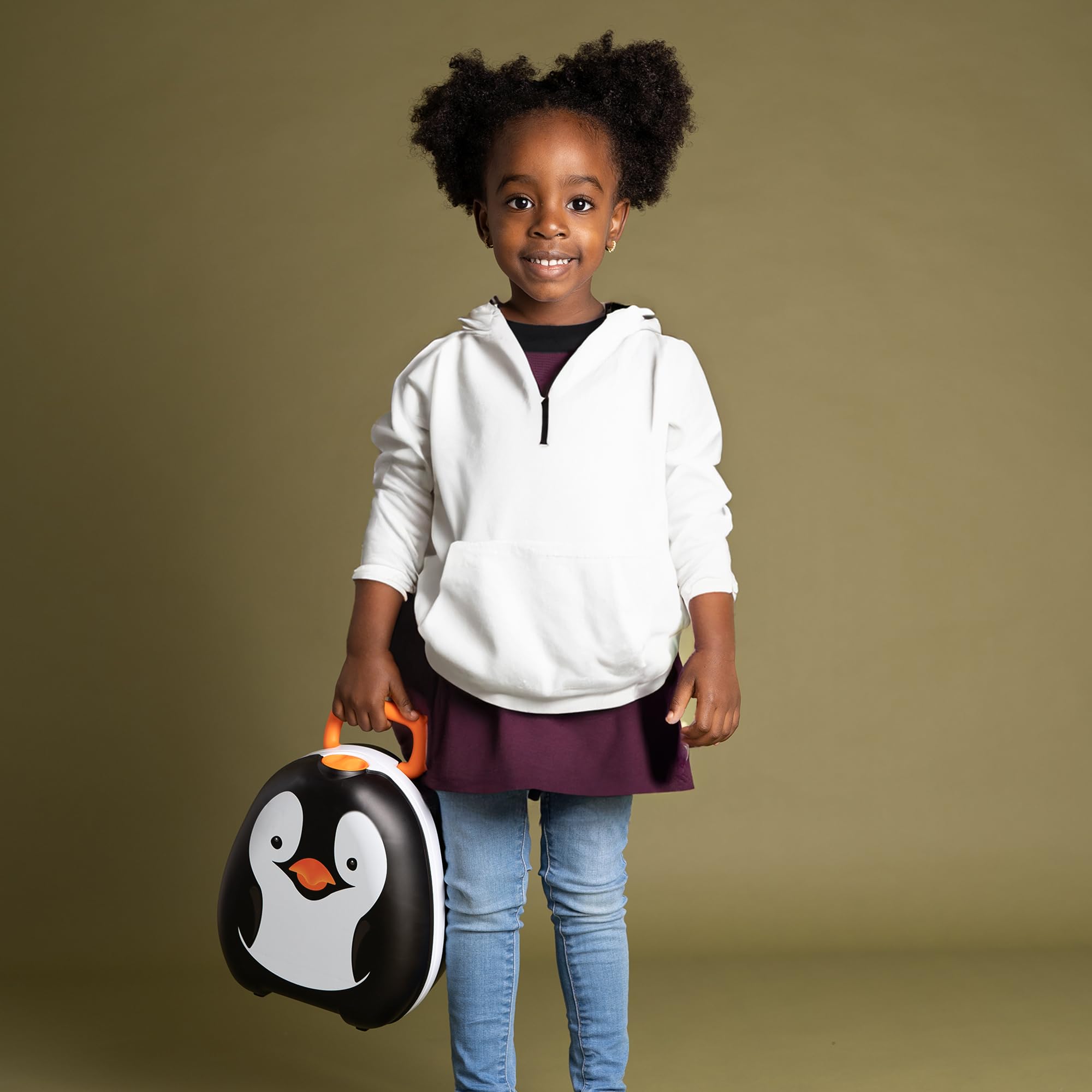 My Carry Potty Penguin travel potty designed with Amanda Jenner for educational use.