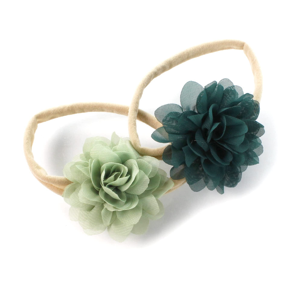 My Lello baby headbands set in light sage and hunter green with soft floral petals.