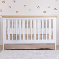 MY LITTLE ZONE brown crib skirt front view for a gender-neutral nursery and tidy space