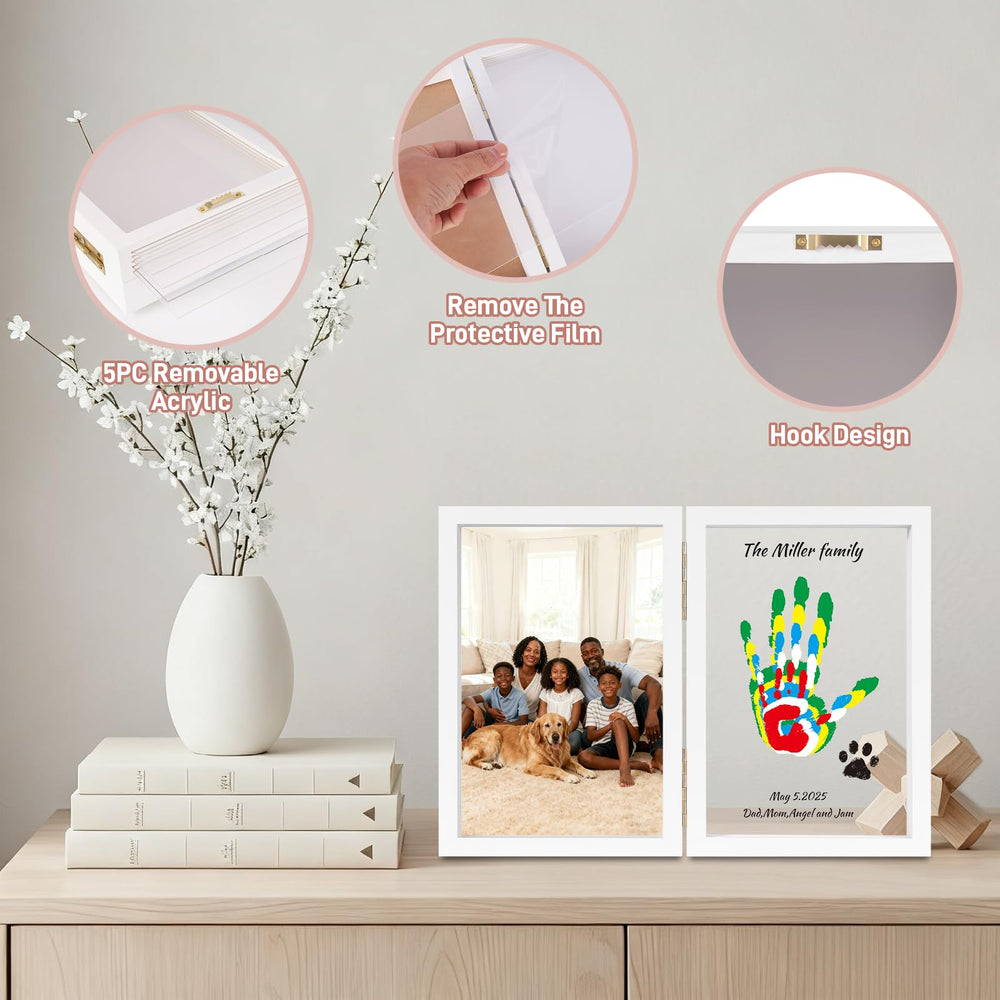 Nabance frame includes photo slot to complement baby handprints with a photo.