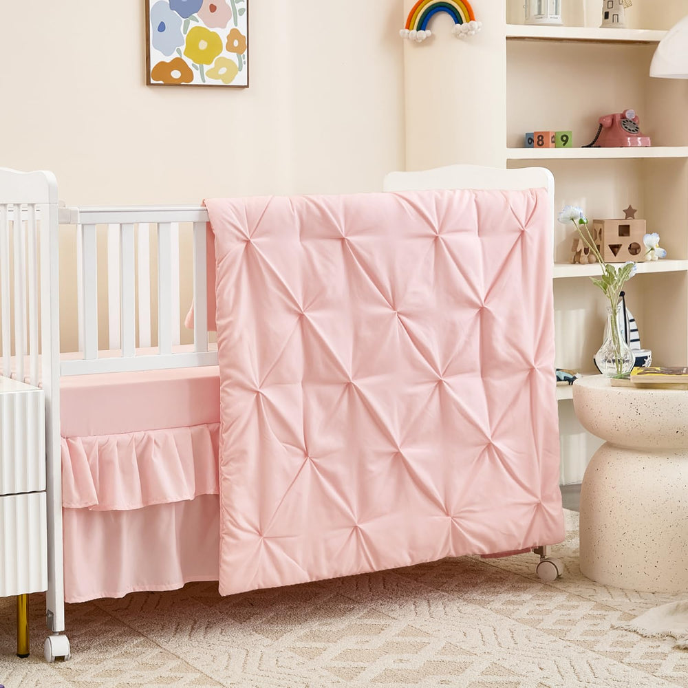 NacoMoco pink crib bedding comforter close-up showing ultra-soft microfiber