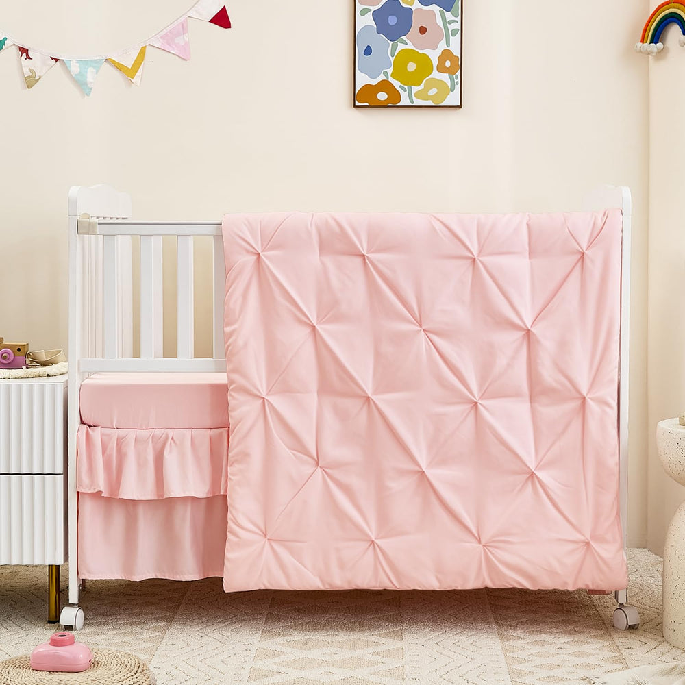 NacoMoco pink crib skirt with 14-inch double-layer hem for a neat nursery look