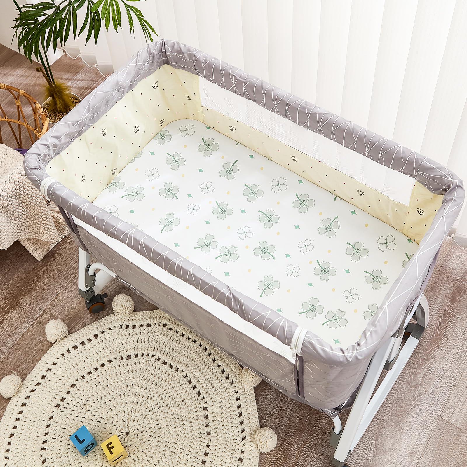 NacoMoco bassinet sheets 35x20 inch fit demonstrates snug elastic band for secure mattress