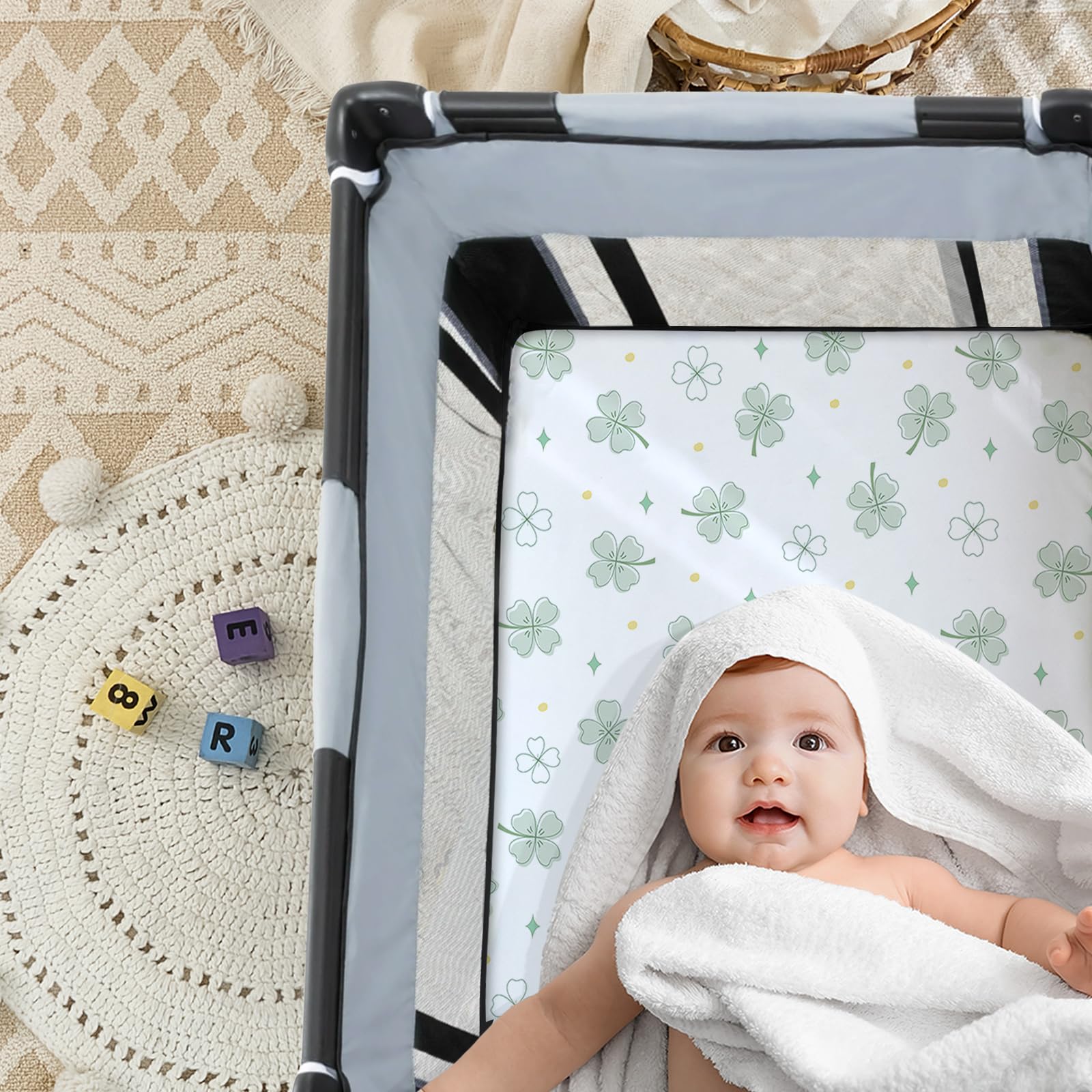 NacoMoco Clover design sheet adds cute decor to playards and cribs.