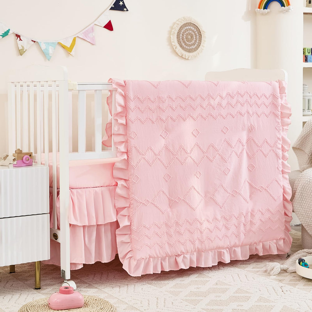NacoMoco crib-sheet-52x28x8-light-pink keeps baby snug in standard-size cribs.