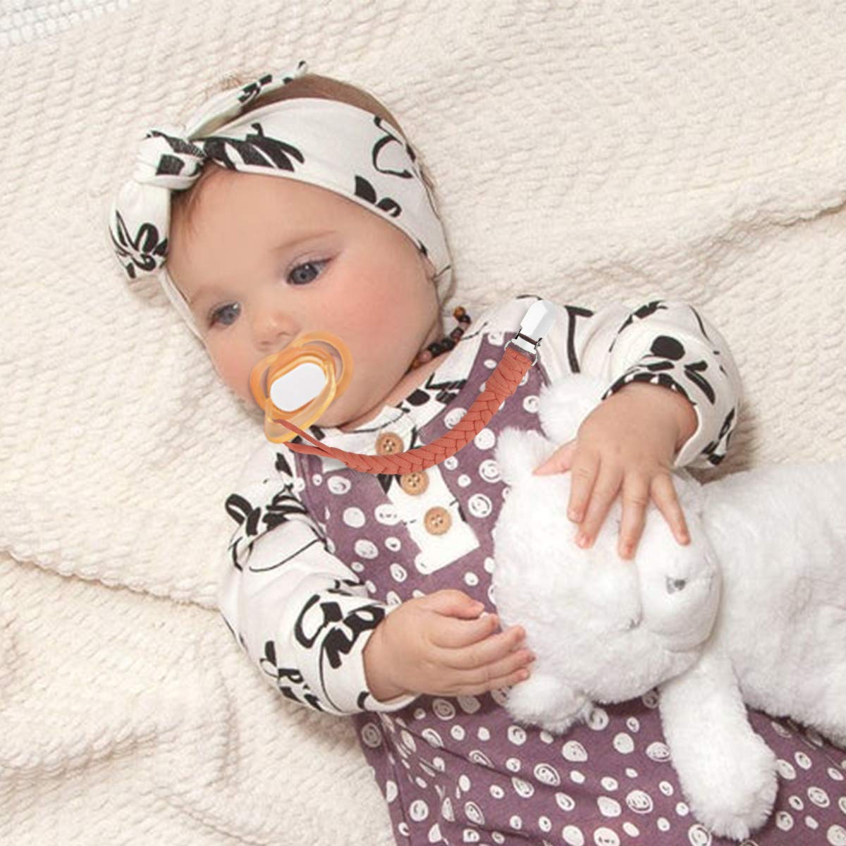 NacyLocalsugee pacifier clip on clothes demo demonstrates secure attachment