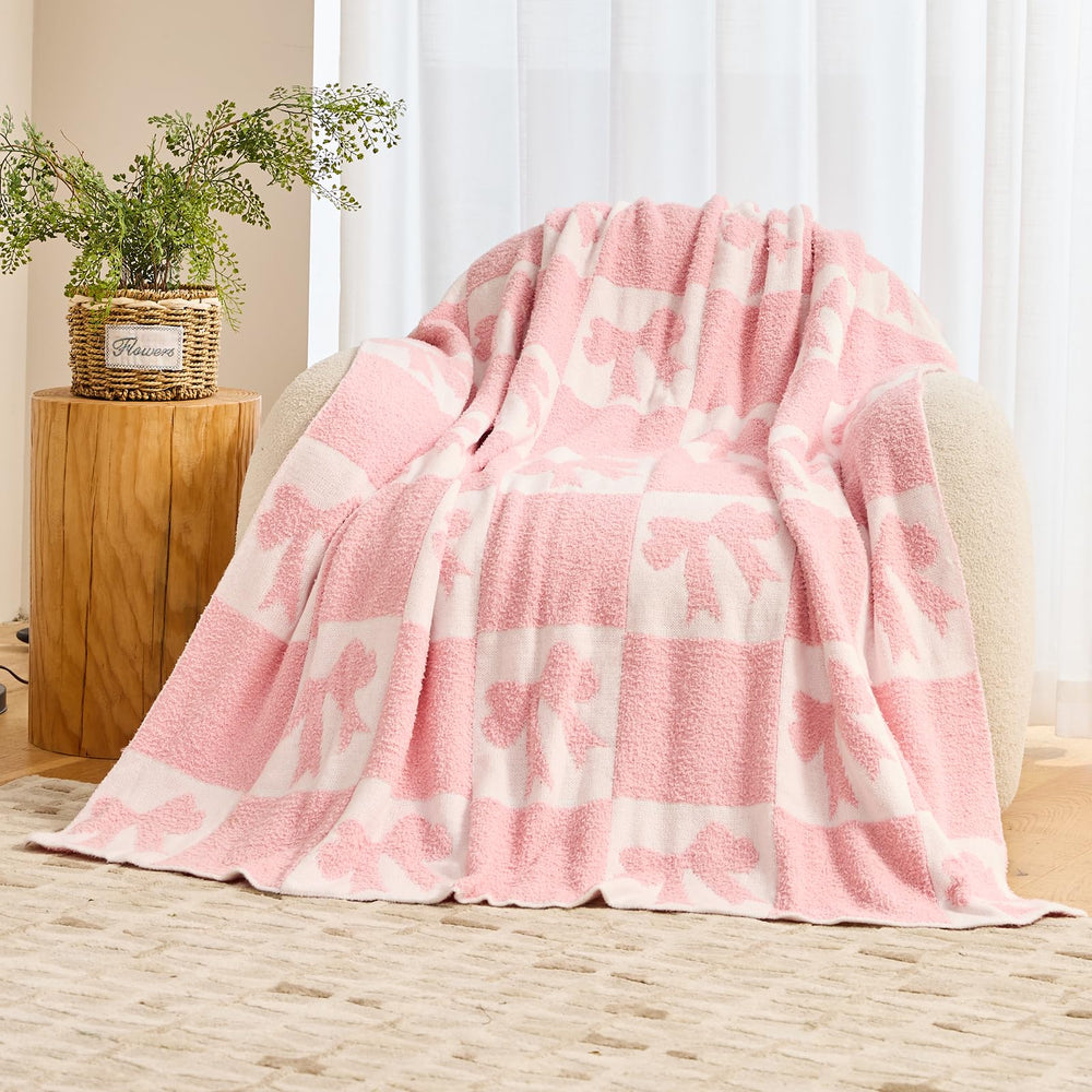 Nahjiiem pink bow knit blanket closeup—plush texture for cozy nights.