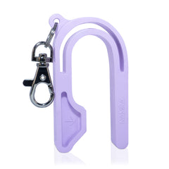 NAMRA car seat key close-up highlighting easy press mechanism for parents