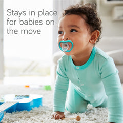 NANOBÉBÉ active pacifiers ergonomic contour fit stays secure on tiny faces.