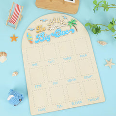 Naozinebi adhesive dots simplify attaching monthly photos.