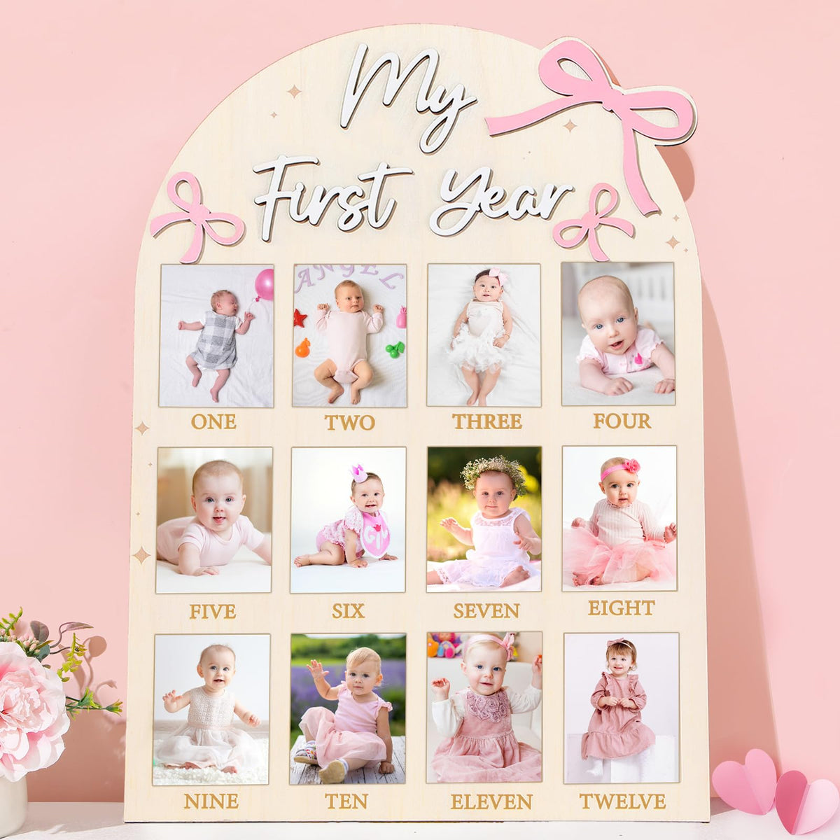 Naozinebi Pink Bow First Year Photo Board shows twelve milestone photos for a keepsake