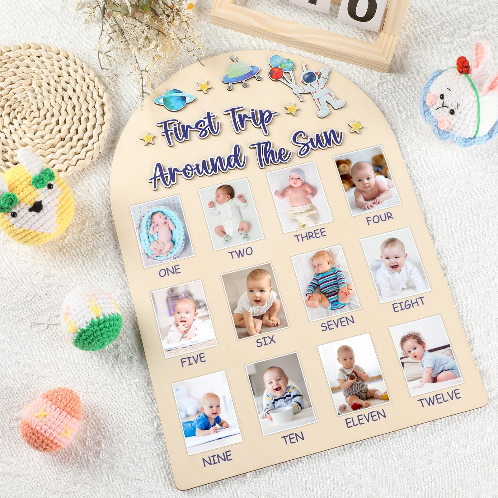 Naozinebi wooden milestone frame hanging in a nursery.
