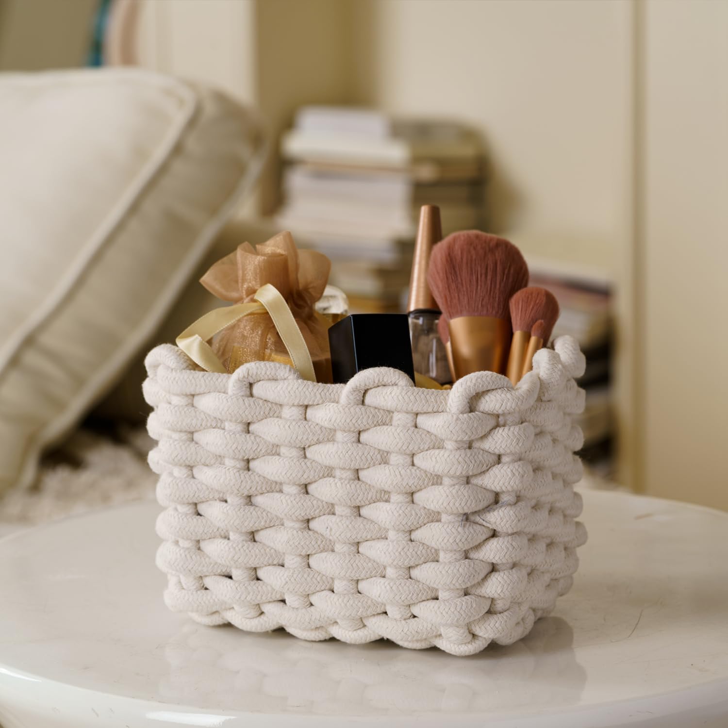 Nashibowu cotton rope basket vanity organizer keeps brushes and cosmetics tidy.