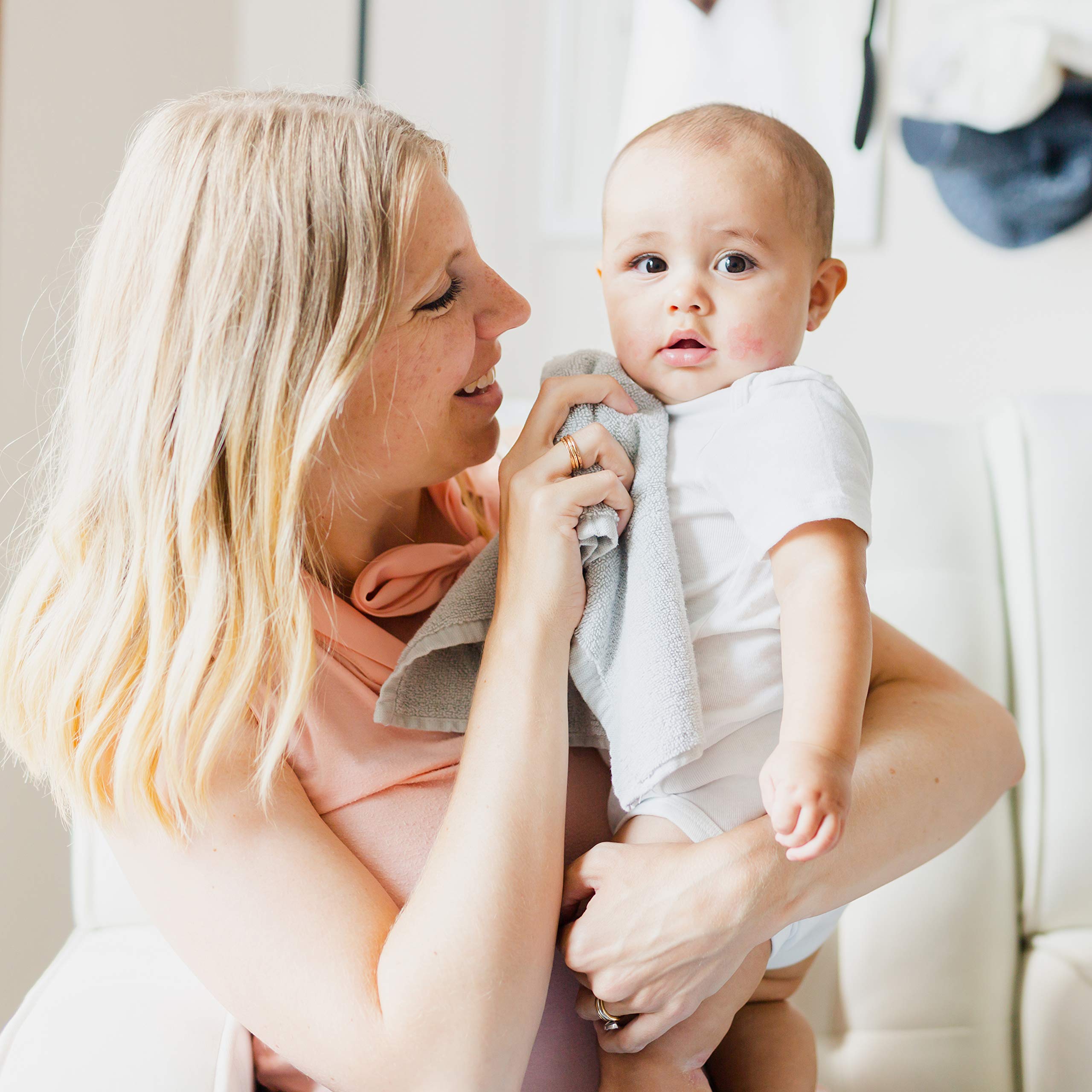 Natemia baby washcloth burp-drool use; gentle wipe during care.