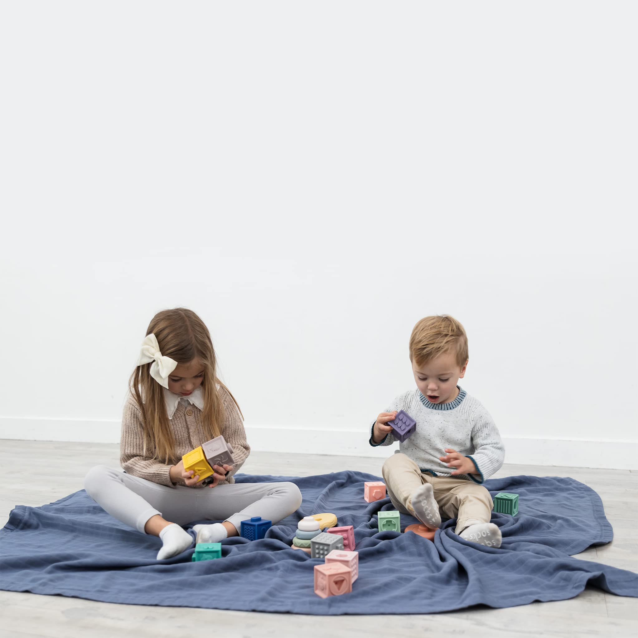 Natemia muslin baby blanket breathable fabric ideal for all-season comfort.