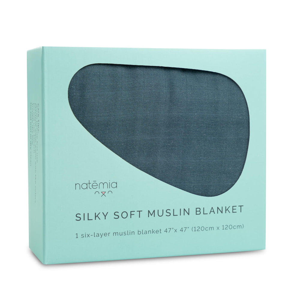 Natemia Muslin Blanket soft closeup shows breathable bamboo-cotton fabric.