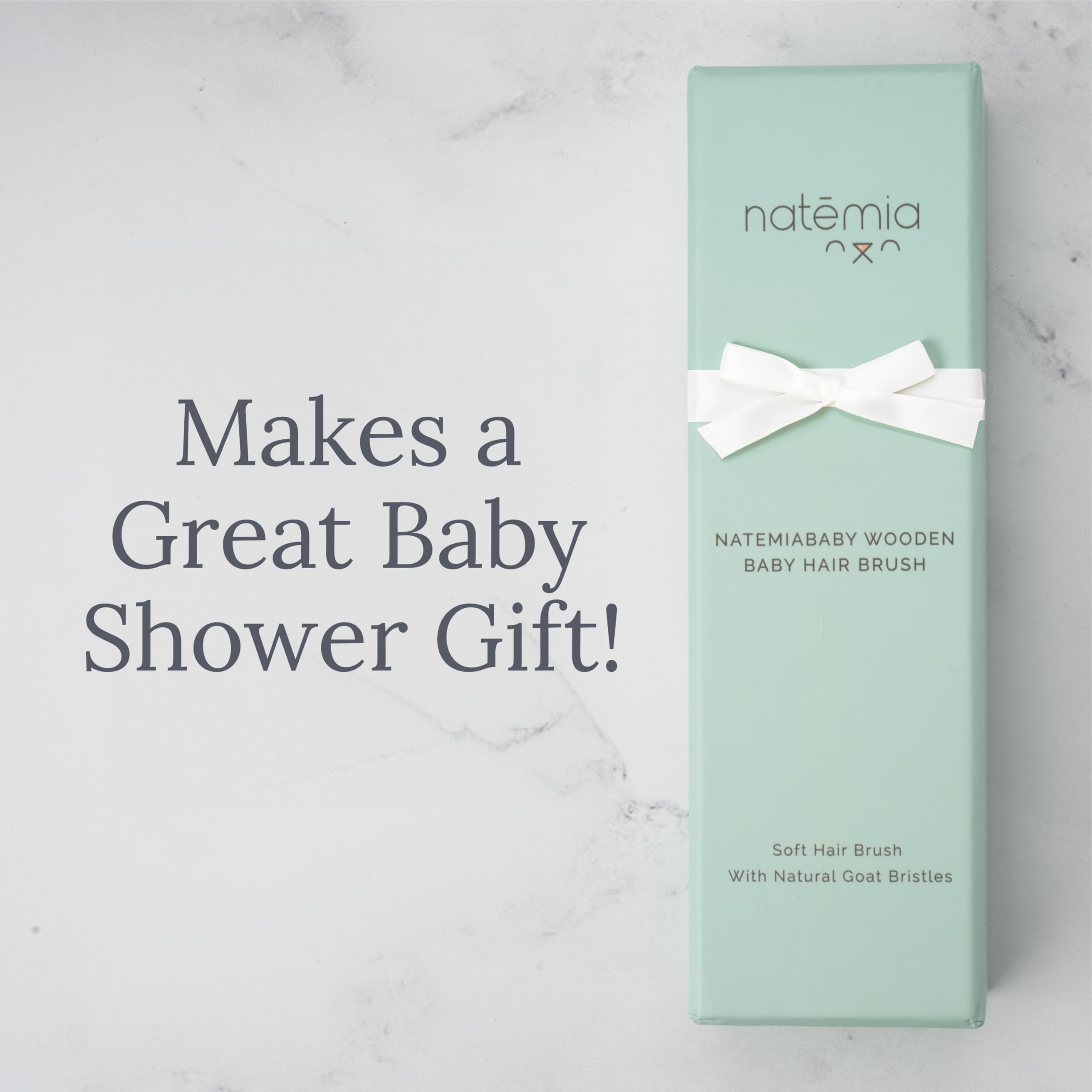Natemia soft goat-hair bristles support gentle newborn and toddler care.