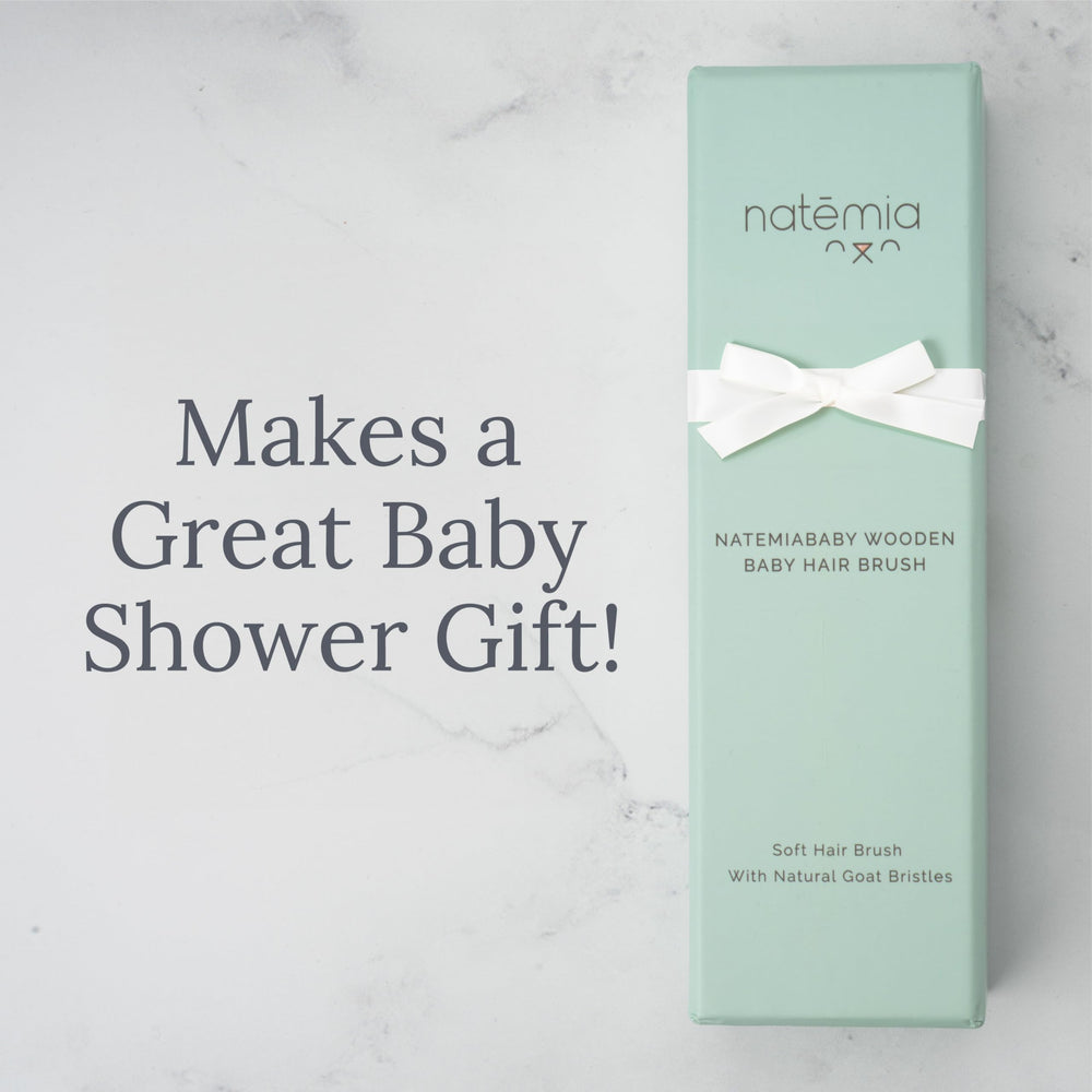 Natemia soft goat-hair bristles support gentle newborn and toddler care.