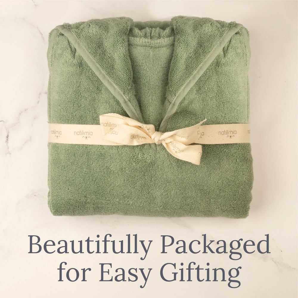 Natemia Towel Poncho Kids Sage size tag showing 6-8T fit.