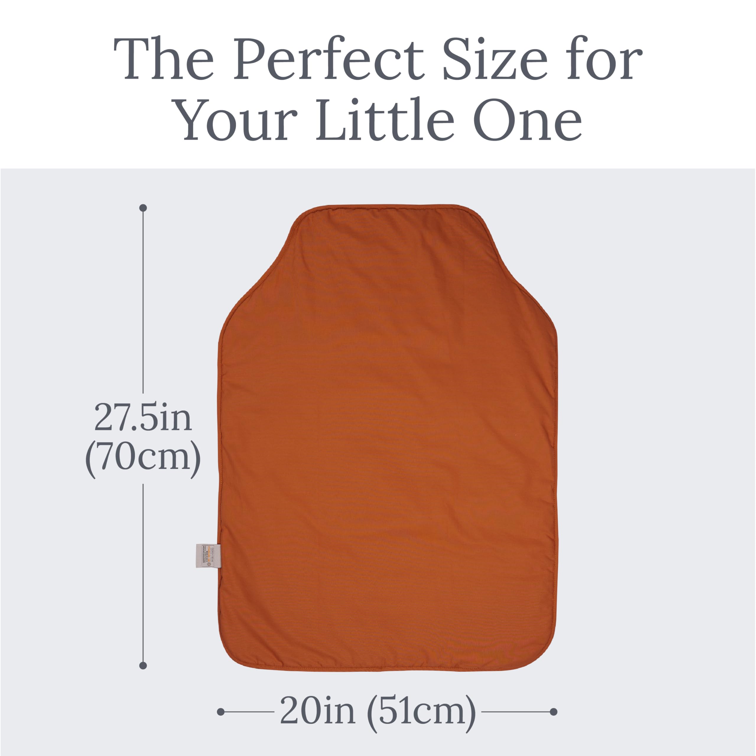 Natemia portable pad rolled and tucked in a diaper bag.