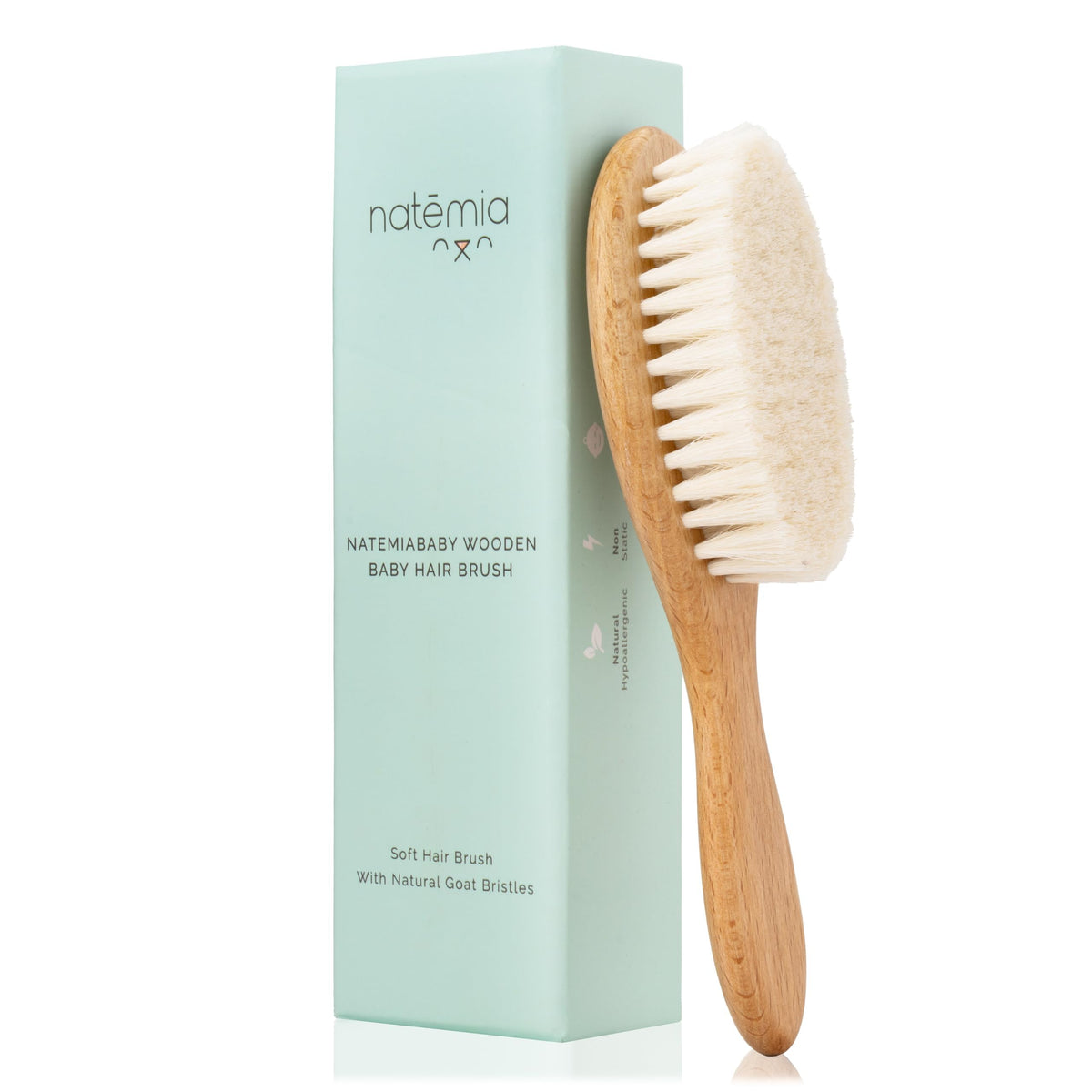 Natemia wooden baby hair brush with goat hair bristles delivering gentle scalp care.