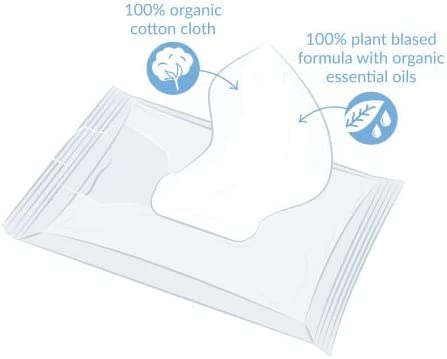 Natracare baby wipes 50ct in use on baby's face for cleansing.