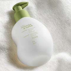 Natura Mamae-e-Bebe conditioner packaging emphasizes eco-friendly, refill-ready design.