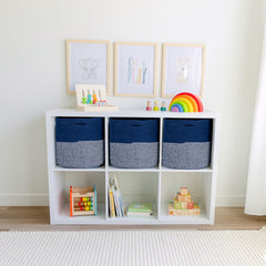 NaturalCozy 3-pack storage bins on shelf demonstrates organized closet space and quick access.