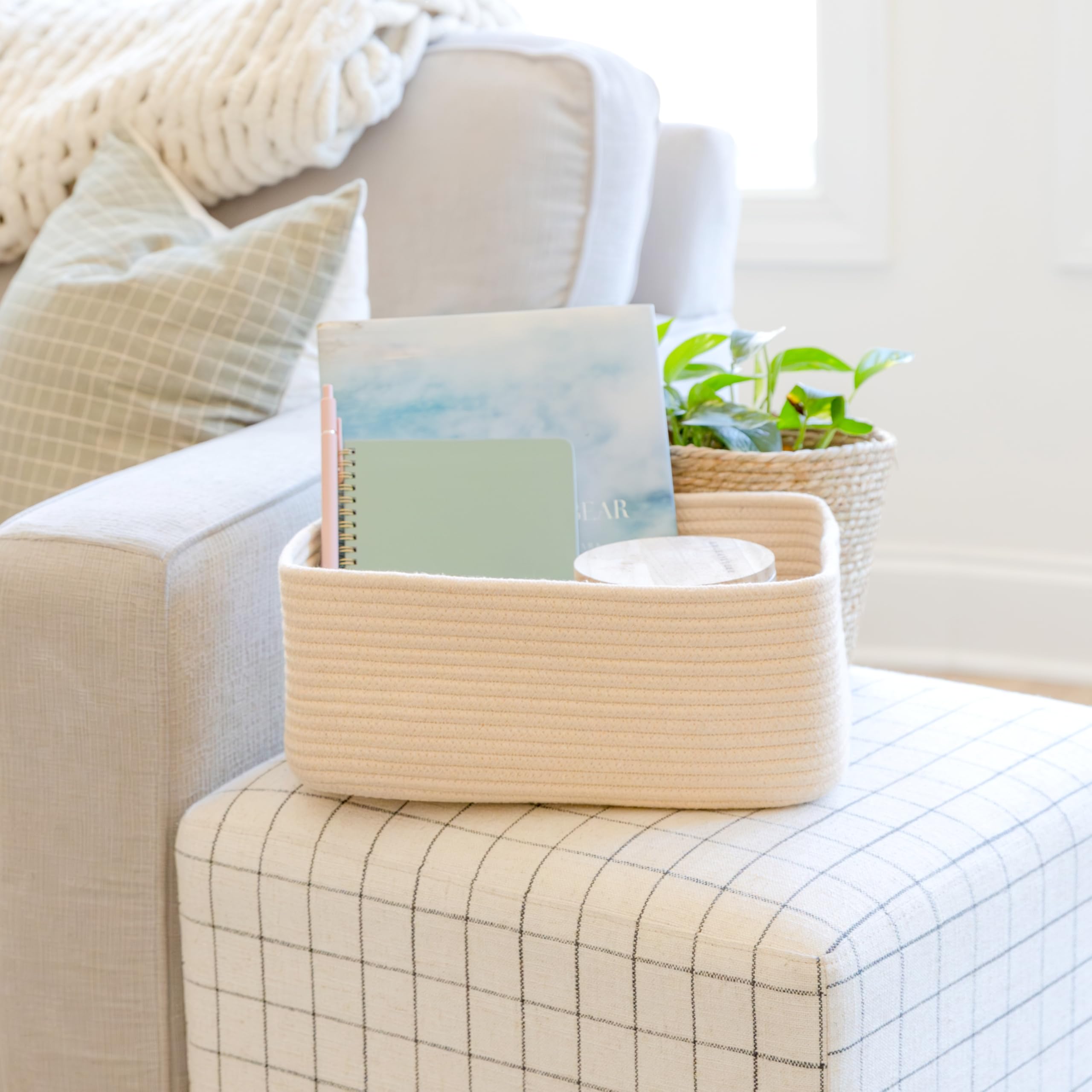 NaturalCozy bathroom closet setup using baskets for towels and toiletries