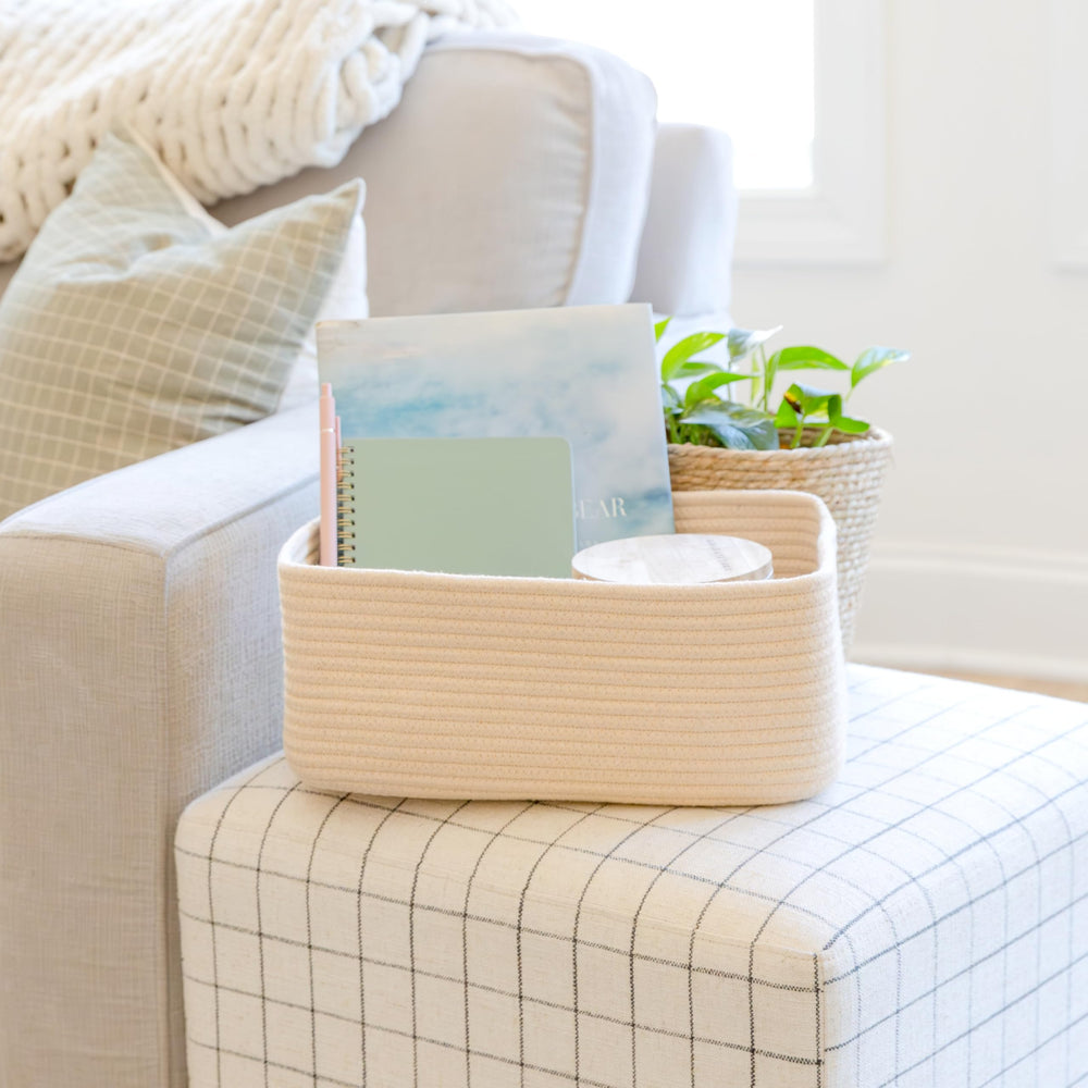 NaturalCozy bathroom closet setup using baskets for towels and toiletries